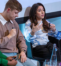 Woman speaking into microphone